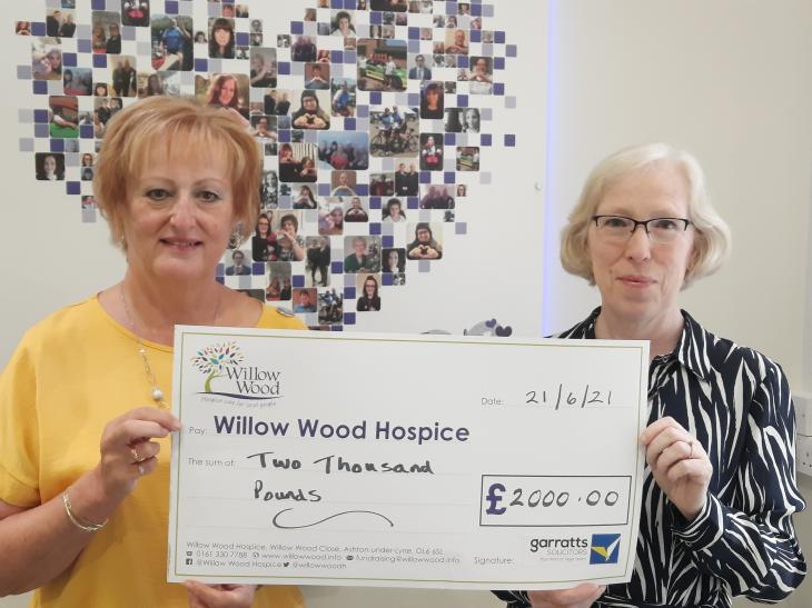 Garratts present £2,000 to Willow Woods Hospice